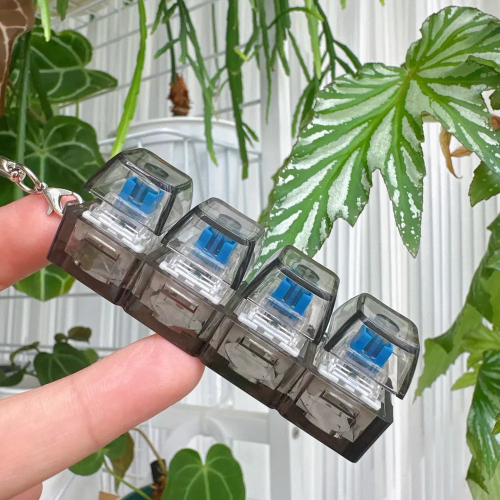 Llavero de teclado mecánico de 4 teclas antiestrés para niños