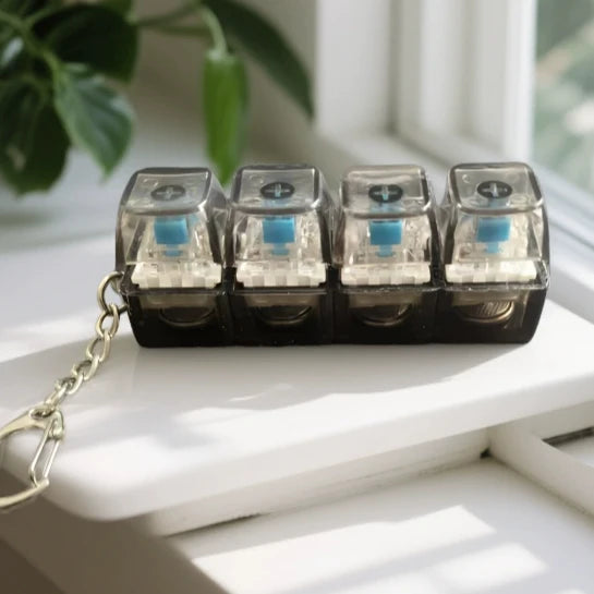 Llavero de teclado mecánico de 4 teclas antiestrés para niños