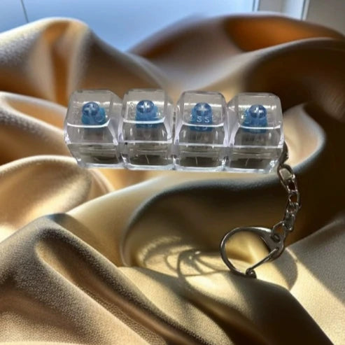 Llavero de teclado mecánico de 4 teclas antiestrés para niños